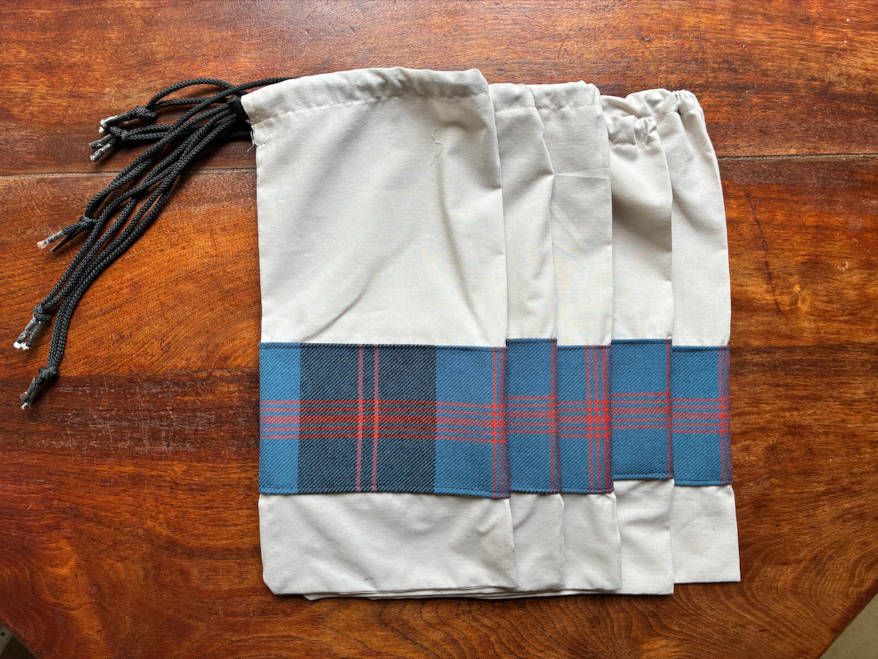 Five Blue Tartan Drawstring Bags by Curlew Crafts