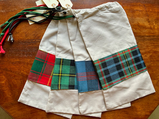 Four assorted Banded Tartan Drawstring Bags by Curlew Crafts