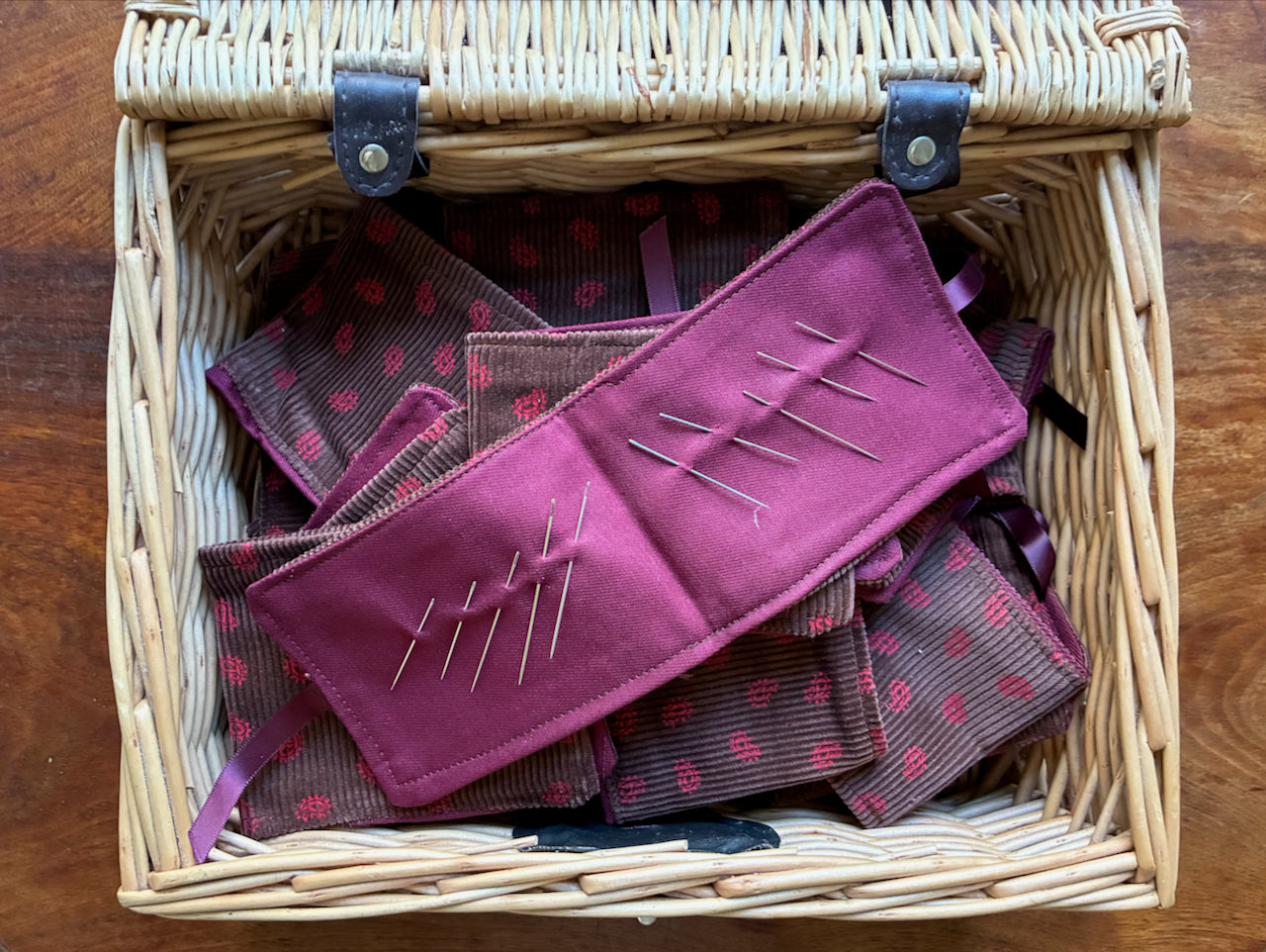 Wicker basket with Paisley Needle Cases by Curlew Crafts