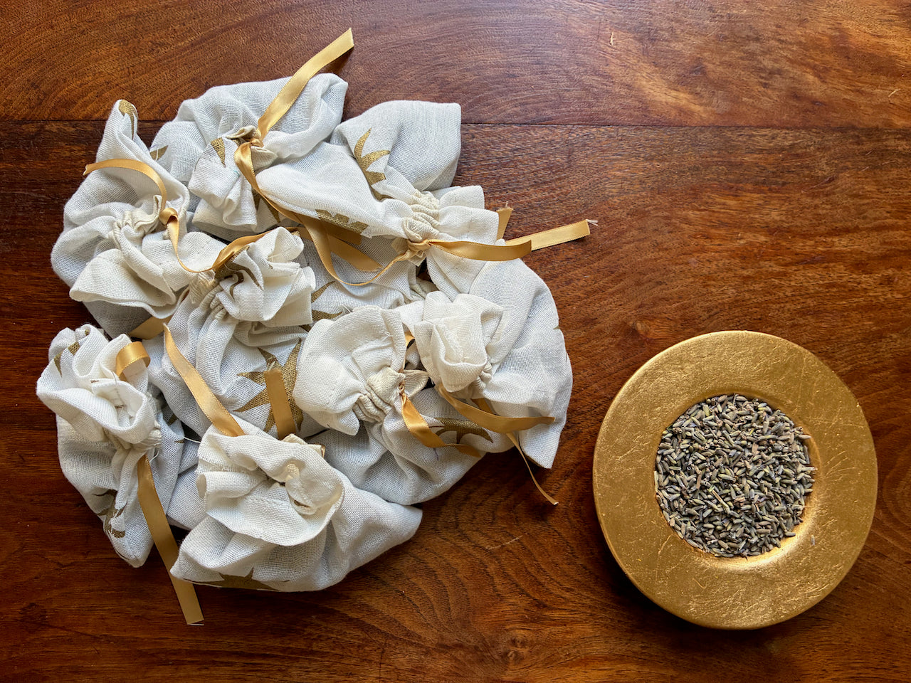 Cream & Gold Lavender Sachets by Curlew Crafts beside a bowl of Lavender
