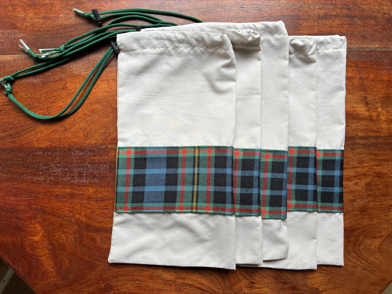Five Green+ Tartan Drawstring Bags by Curlew Crafts