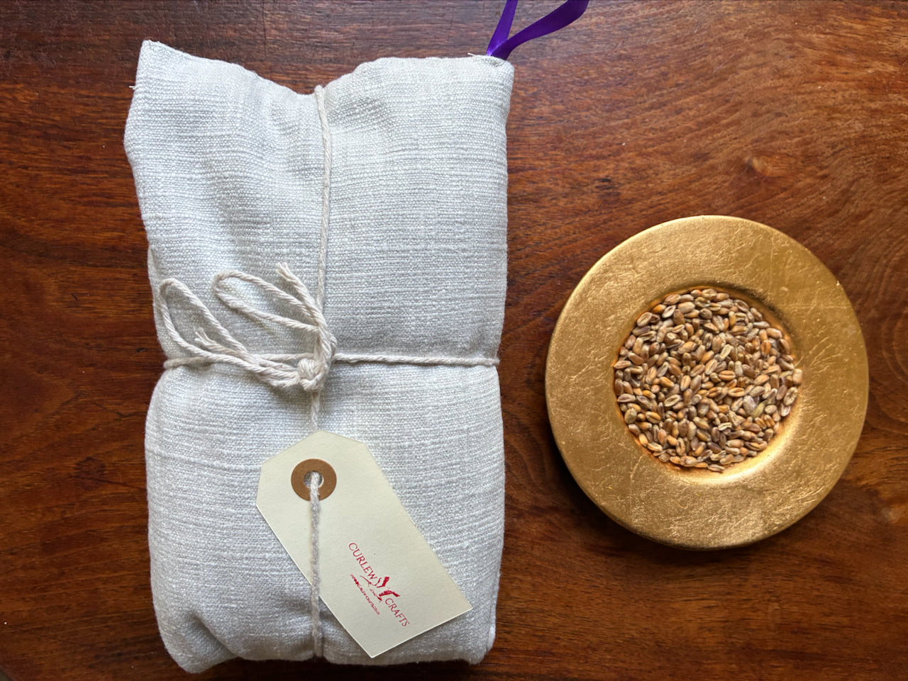 Lavender Scented Wheat Bag by Curlew Crafts with a bowl of Wheat Grain