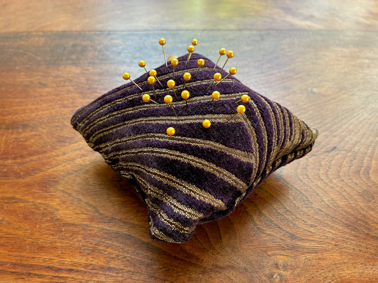 Purple and gold Art Deco Chenille Pin Cushion with Gold pins by Curlew Crafts