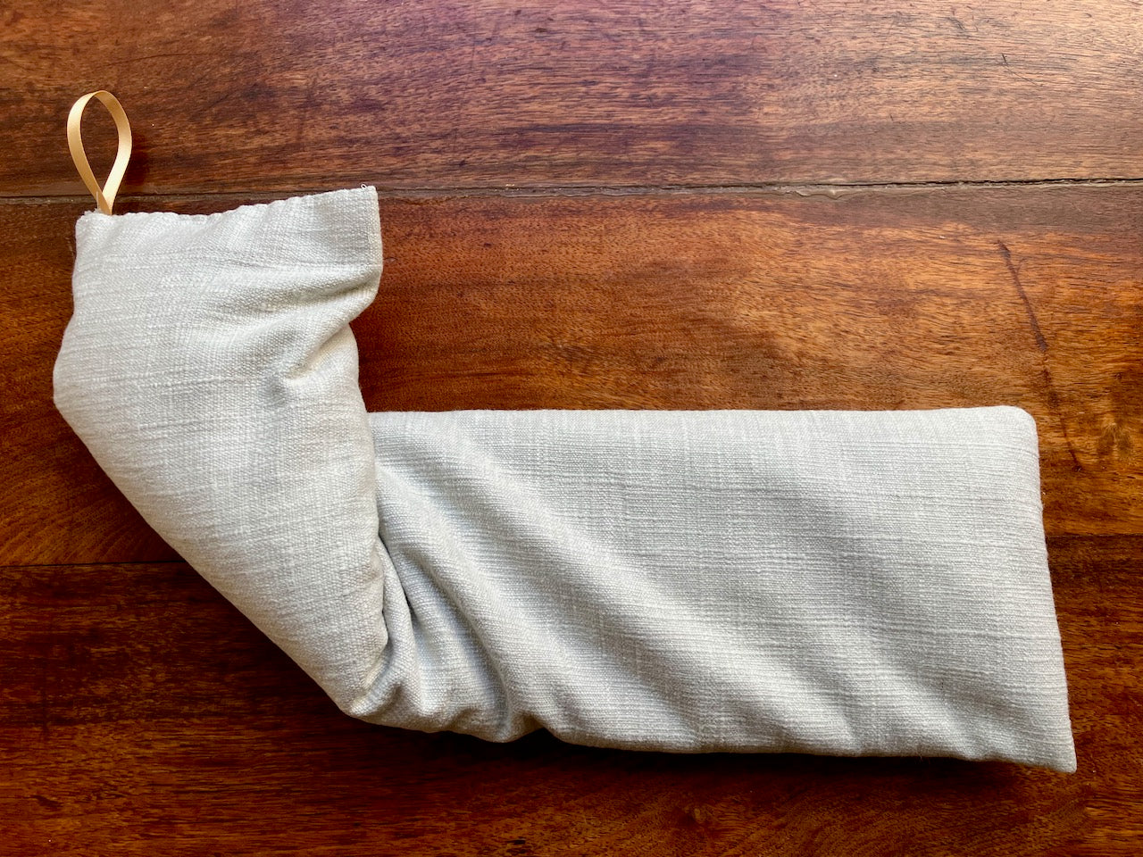Single Natural Un-scented Linen Wheat Bag with gold ribbon hook by Curlew Crafts