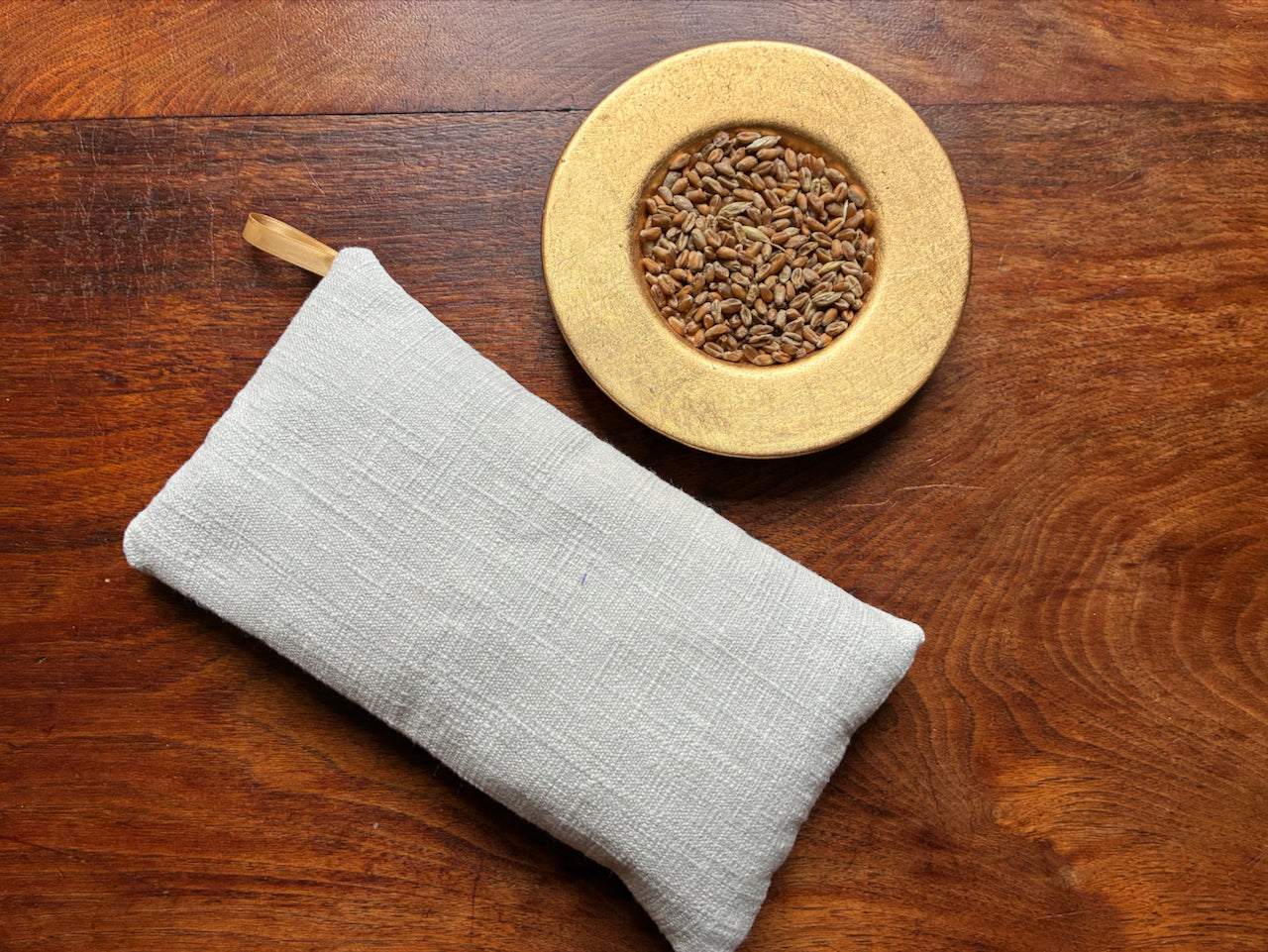 Small Linen Wheat Bag by Curlew Crafts by a bowl of wheat grain