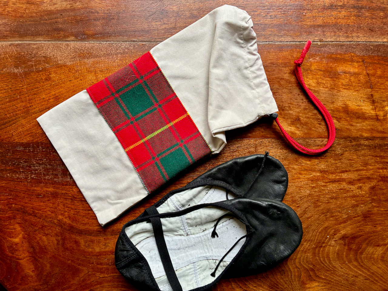 Red Tartan Drawstring Bag by Curlew Crafts with a pair of dance shoes