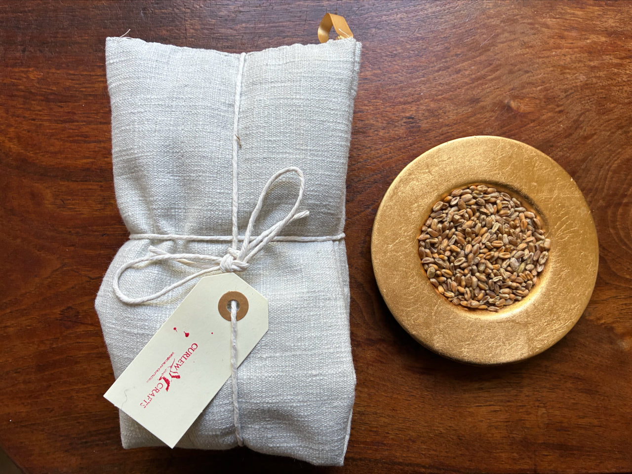 Unscented Linen Wheat  Bag by Curlew Crafts with a bowl of Wheat Grain